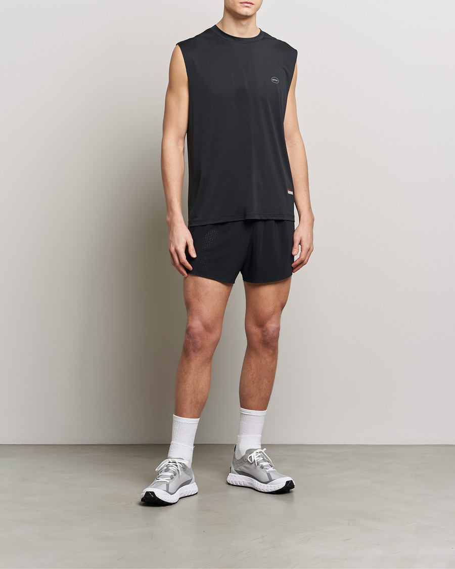 Satisfy AuraLite Muscle Tee Black at CareOfCarl.com