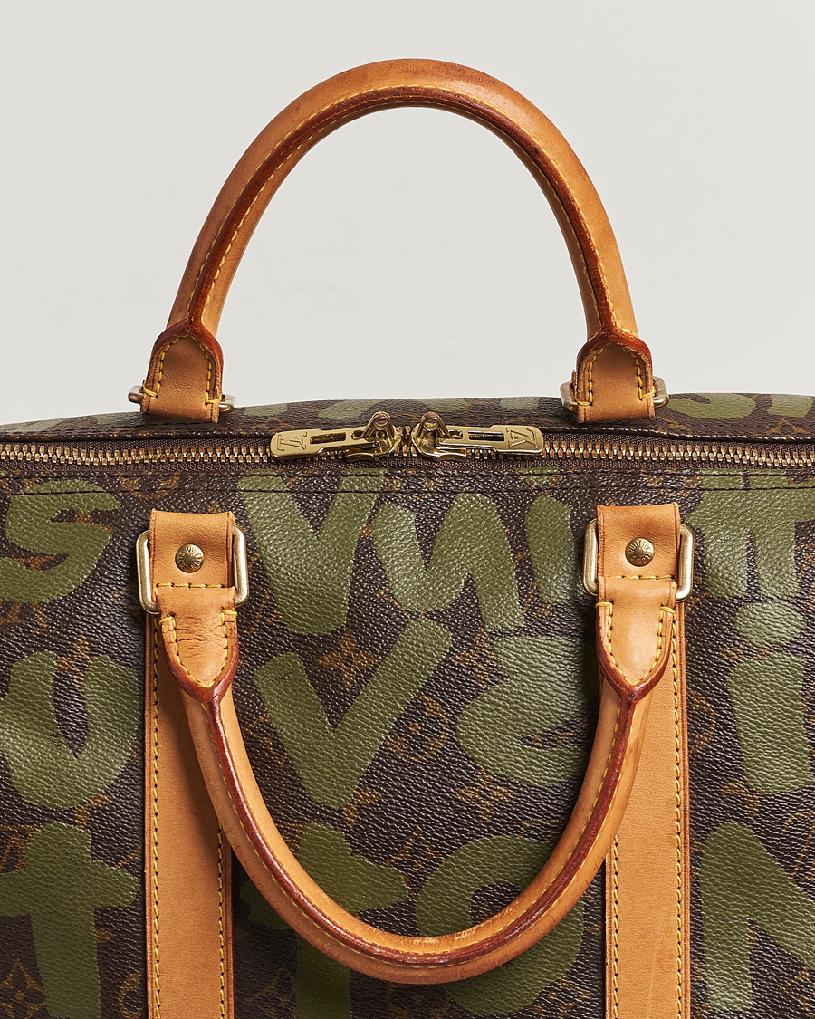 Louis Vuitton Pre-Owned Keepall 50 Bag Graffiti at CareOfCarl.com
