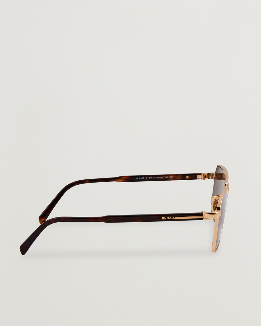 Prada 0PR A57S Metal Sunglasses Gold at CareOfCarl.com