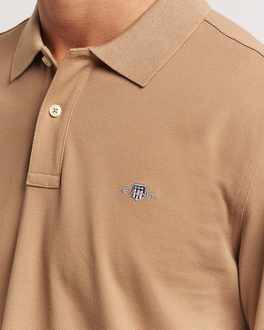 Men | Sweaters & Knitwear | GANT | Regular Shield Pique Polo Warm Khaki