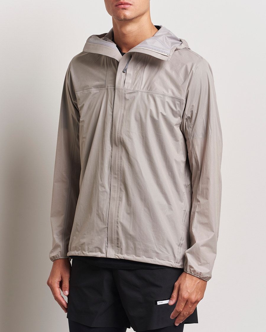 Men | Coats & Jackets | Houdini | The Orange Jacket Sandstorm