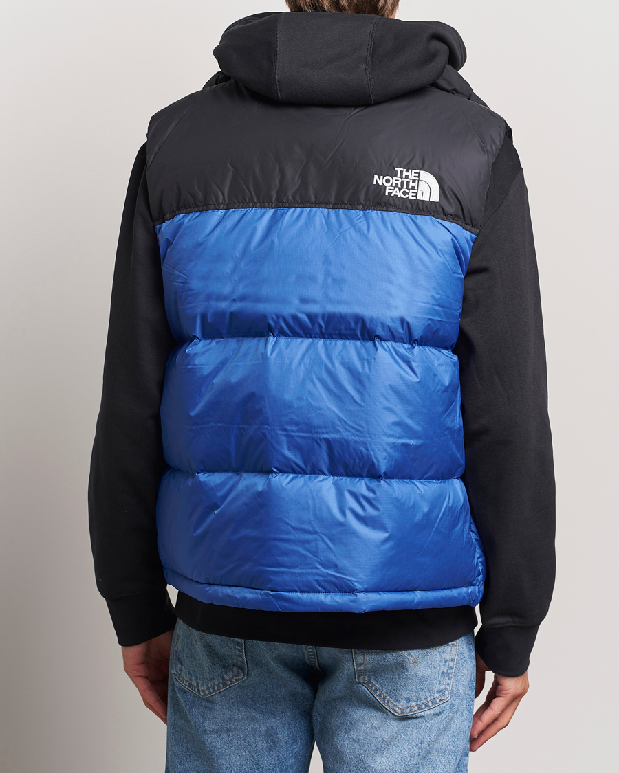 The North Face 1996 Retro Nuptse Vest Black/Blue at CareOfCarl.com