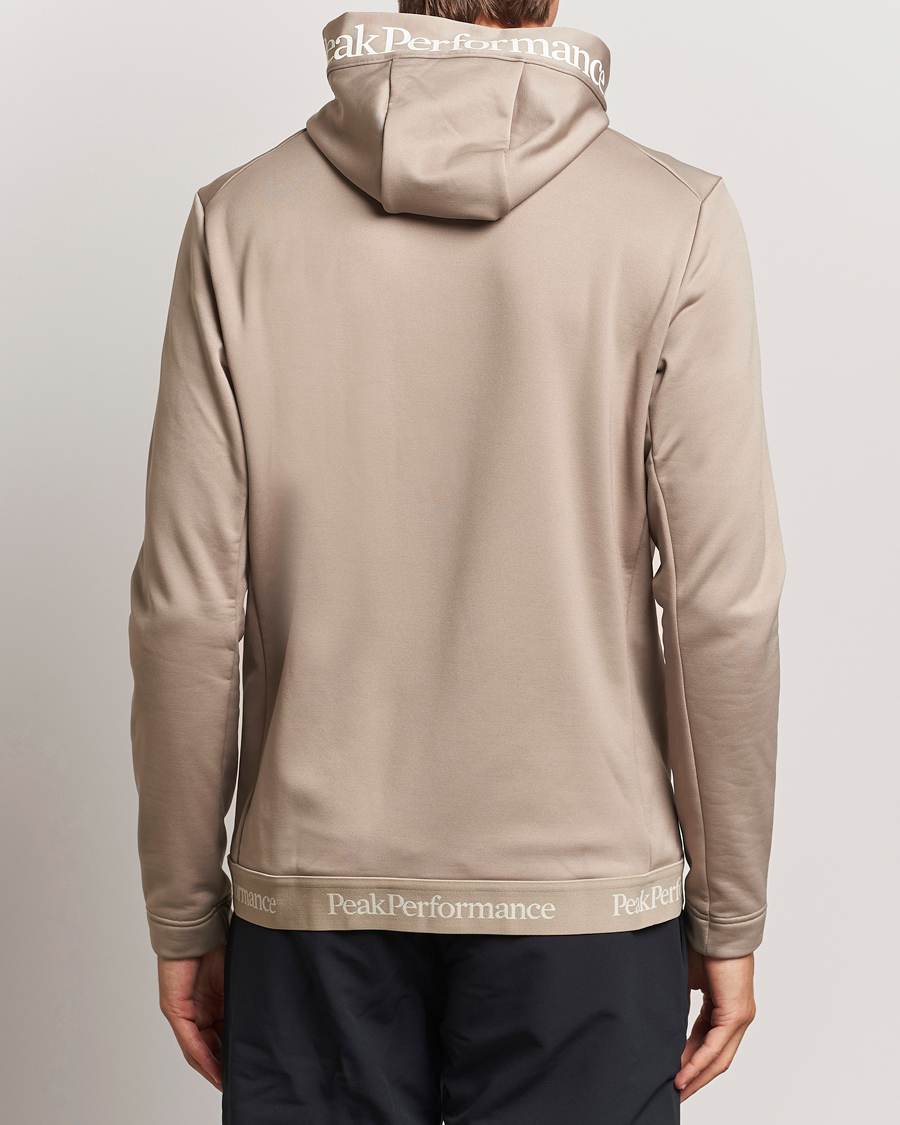 Men | Sweaters & Knitwear | Peak Performance | Rider Tech Zip Hood Avid Beige