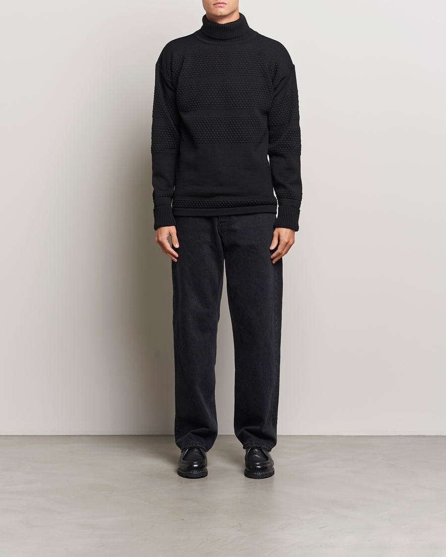 S.N.S. Herning Fisherman Wool Rollneck Sweater Black at CareOfCarl.com