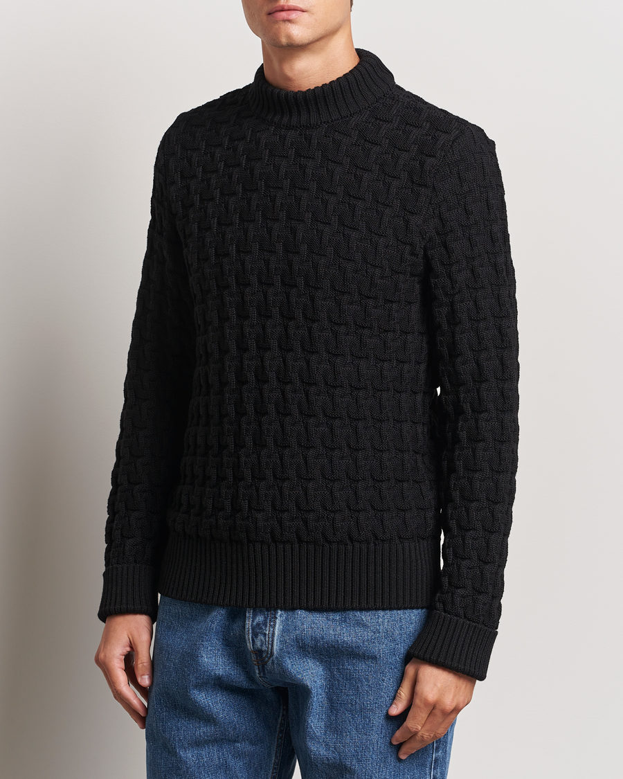 S.N.S. Herning Stark Wool Cable Knit Sweater Black at CareOfCarl.com