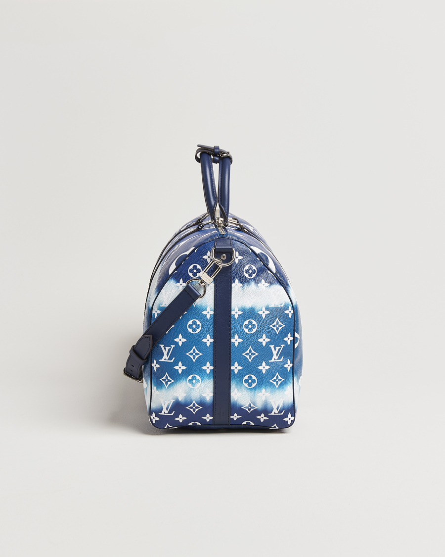 Bonhams : Blue Escale Tie-Dye Monogram Keepall Bandoulière 50, Louis  Vuitton, Limited Edition c. 2020, (Includes luggage tag, padlock, keys,  dust bag, box and copy of original receipt)