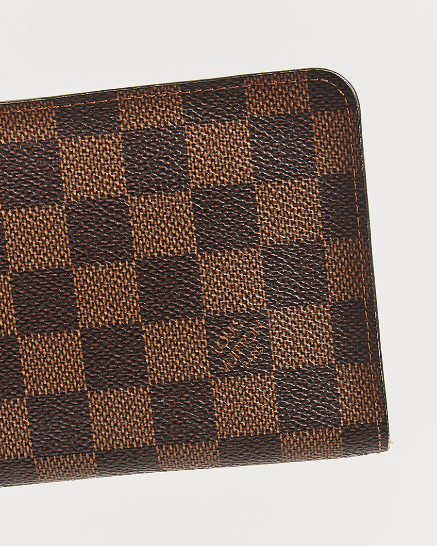 Men | Louis Vuitton Pre-Owned Porte Monnaie Zippy Wallet Damier Ebene | Louis Vuitton Pre-Owned | Porte Monnaie Zippy Wallet Damier Ebene