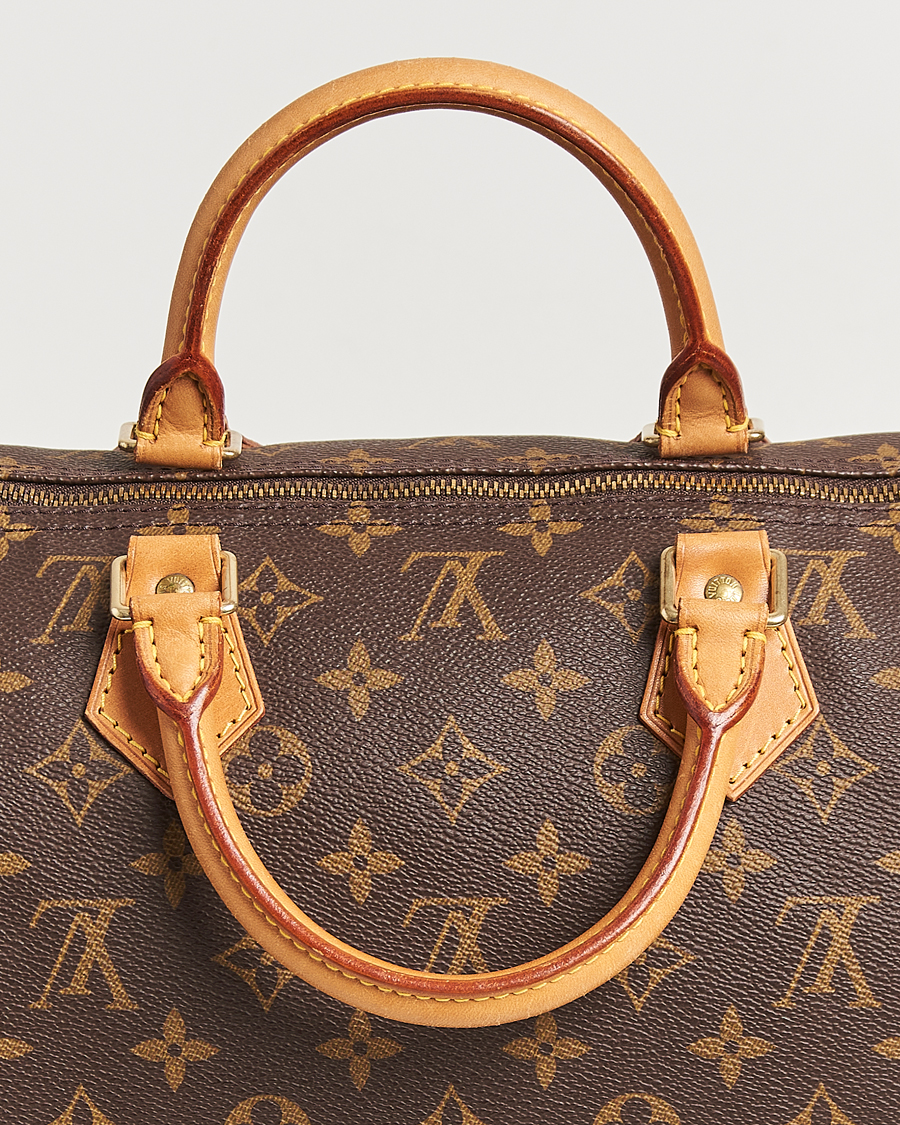 Louis Vuitton Pre-Owned Speedy 40 Handbag Monogram at CareOfCarl.com