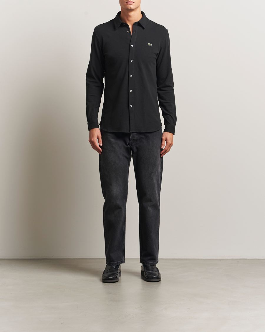 Lacoste Slim Fit Cotton Piqu Shirt Black at CareOfCarl.com Lacoste Slim Fit Cotton Piqu Shirt Black at CareOfCarl.com