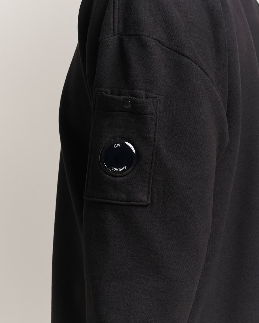 Men | Sweaters & Knitwear | C.P. Company | Brushed Emerized Fleece Lens Sweatshirt Black
