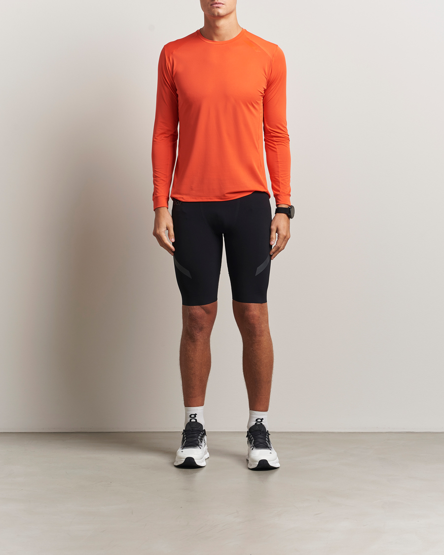 SOAR Running Long Sleeve Tech Tee Orange at CareOfCarl.com