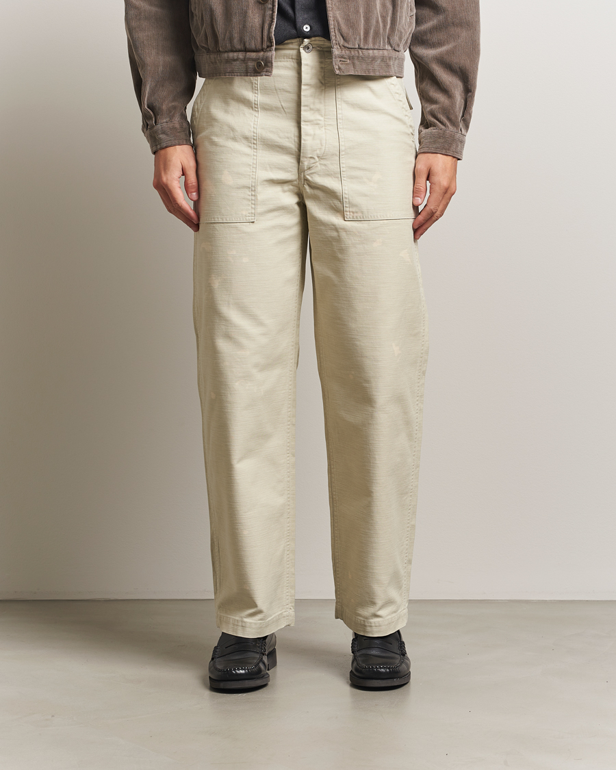 Auralee Bleached Satin Baker Pants Ivory at CareOfCarl.com