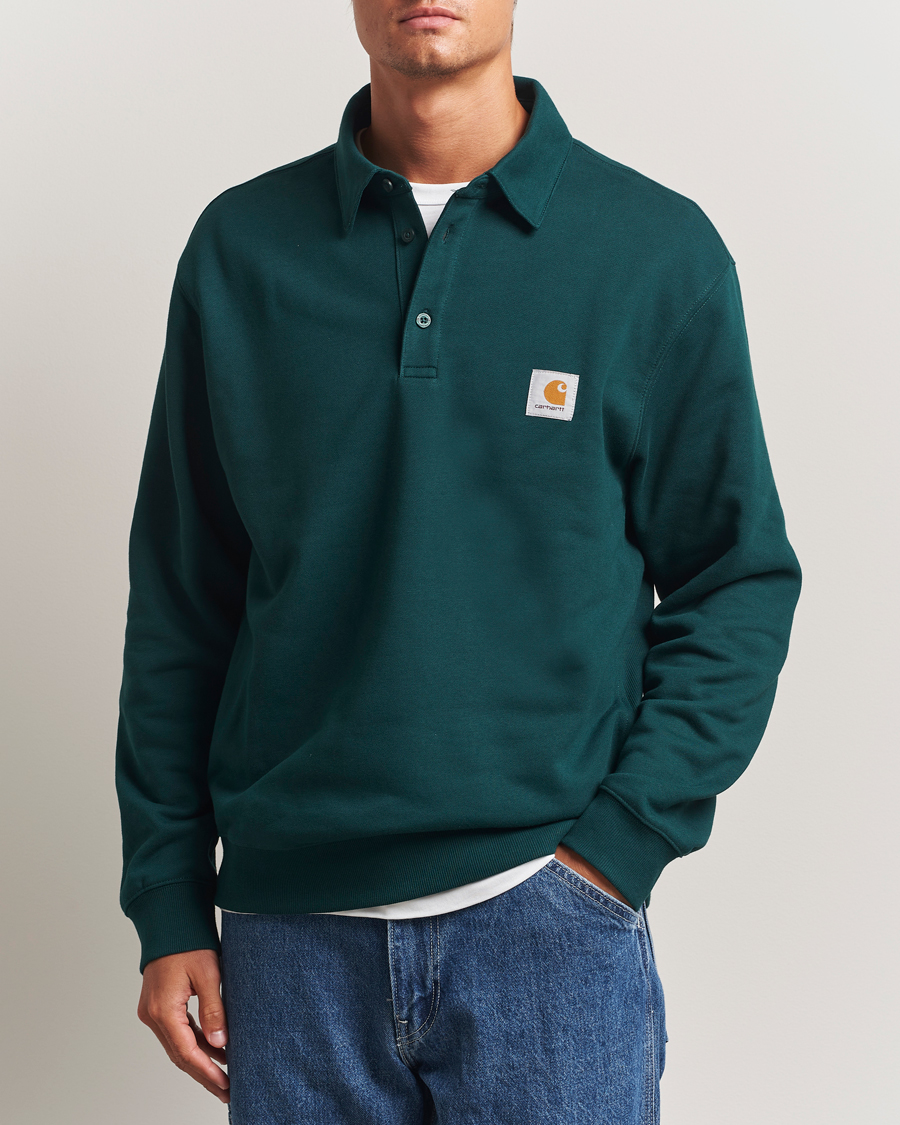 Carhartt WIP Polo Sweatshirt Dark Fir at CareOfCarl.com