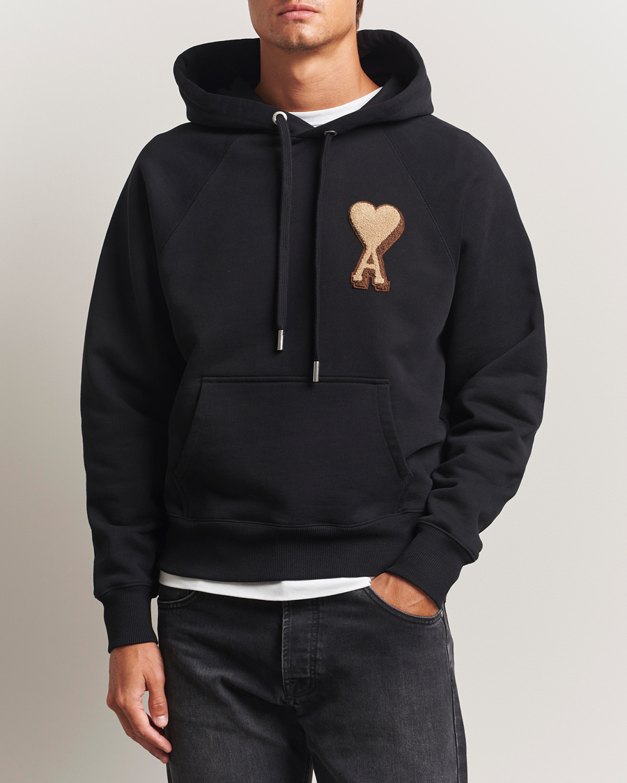 AMI Big Heart Logo Wool Knitted Sweater Black at CareOfCarl.com AMI Big Heart Logo Wool Knitted Sweater Black at CareOfCarl.com