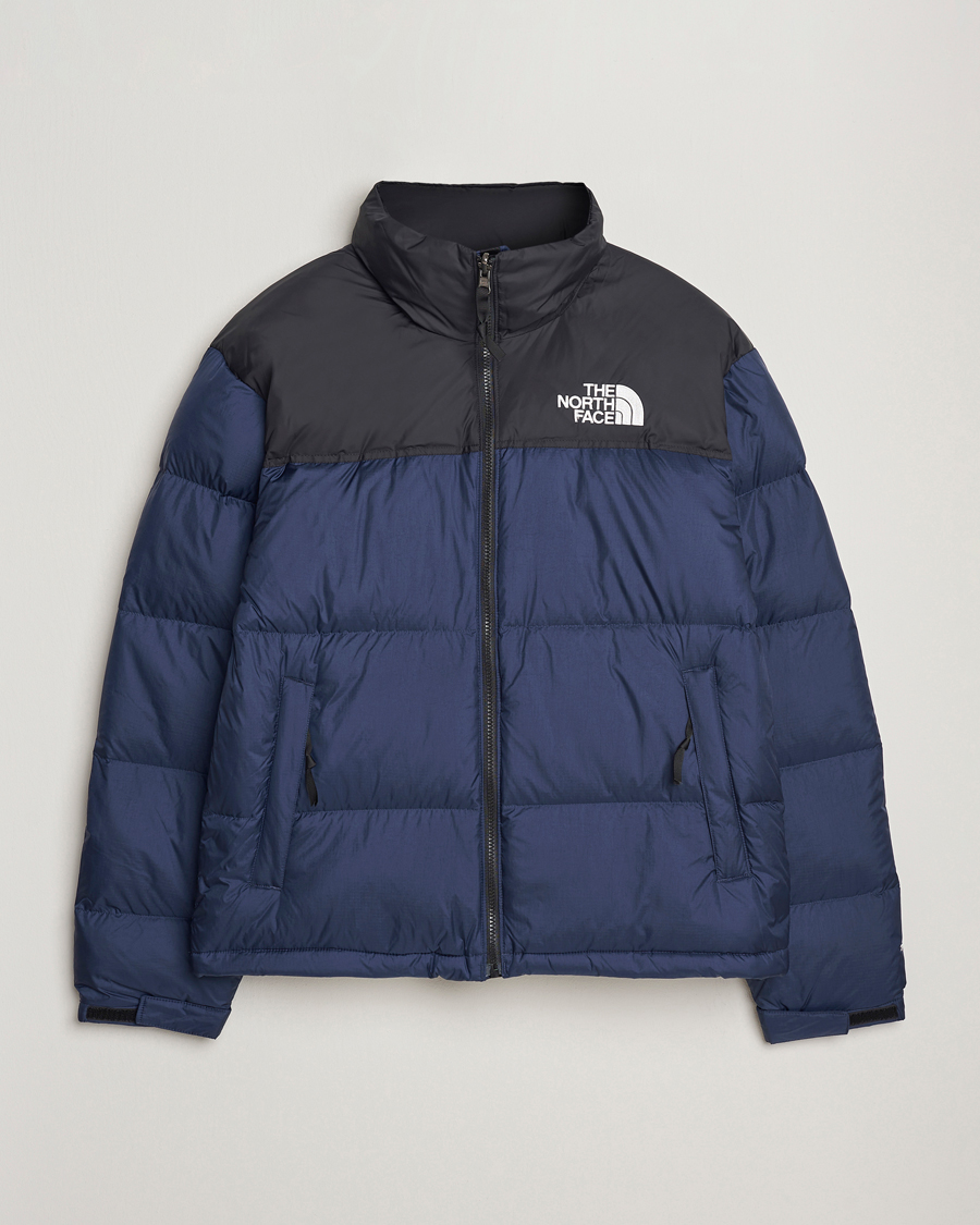 The North Face 1996 Retro Nuptse Jacket Navy at CareOfCarl.com
