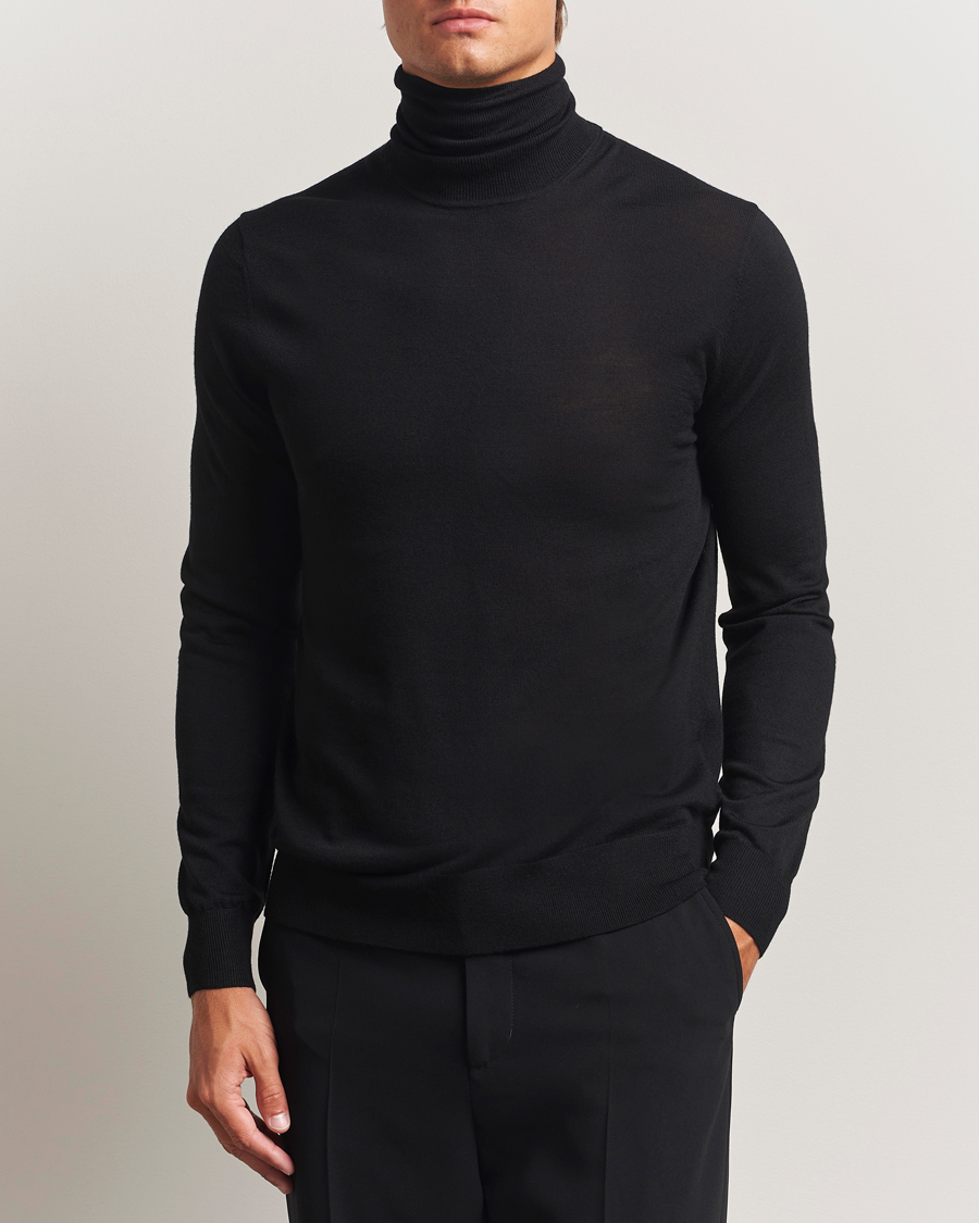 Men | Sweaters & Knitwear | Tiger of Sweden | Nevile Extra Fine Merino Polo Black