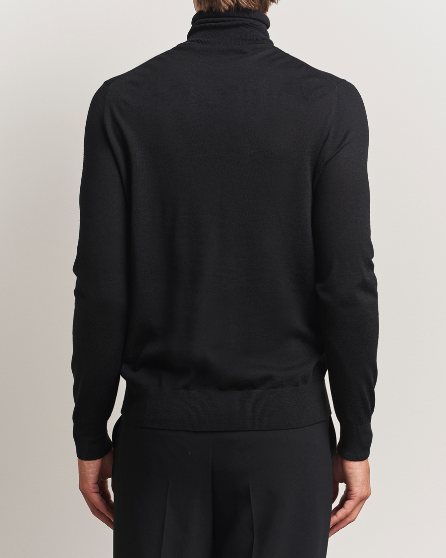 Men | Sweaters & Knitwear | Tiger of Sweden | Nevile Extra Fine Merino Polo Black