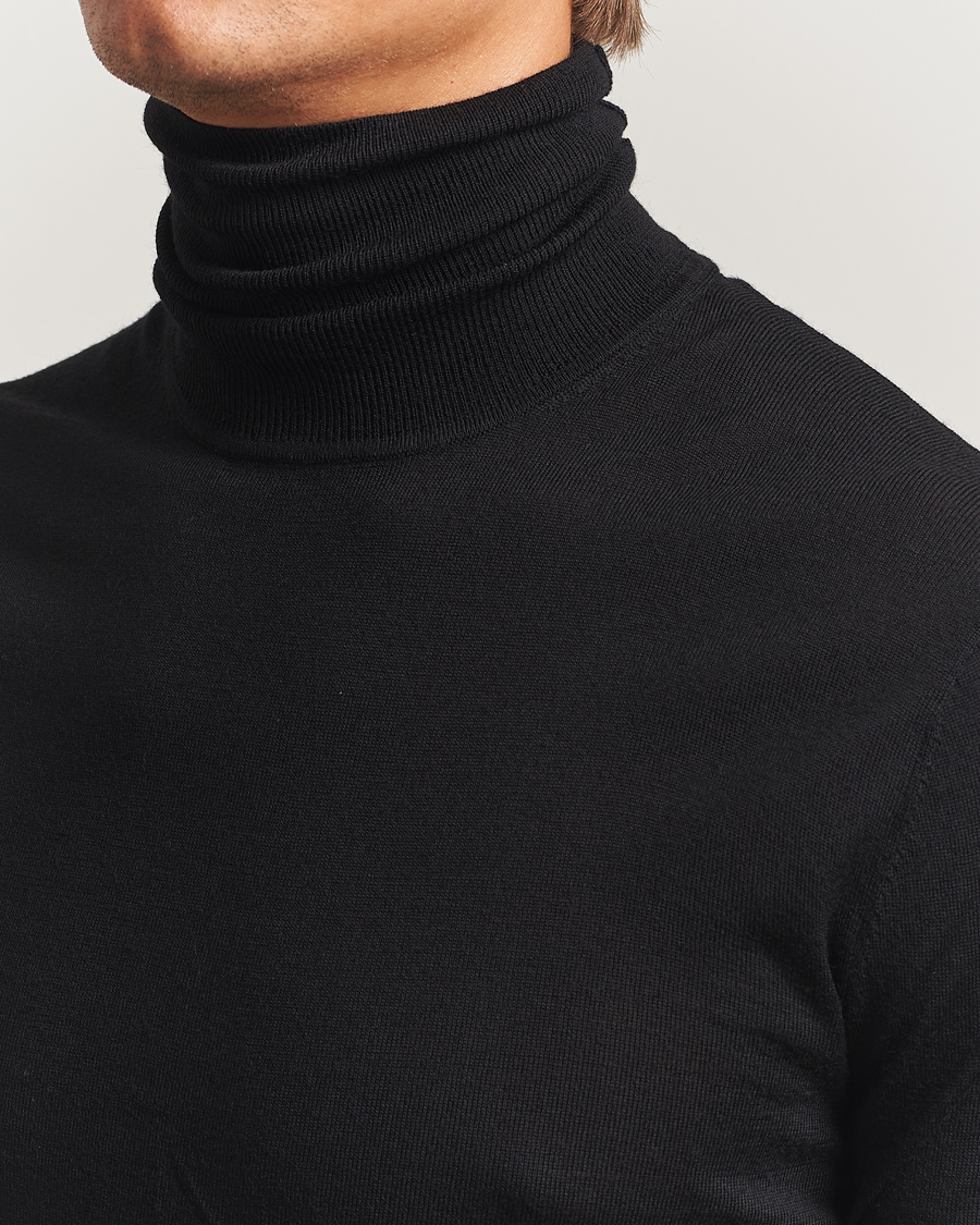 Men | Sweaters & Knitwear | Tiger of Sweden | Nevile Extra Fine Merino Polo Black