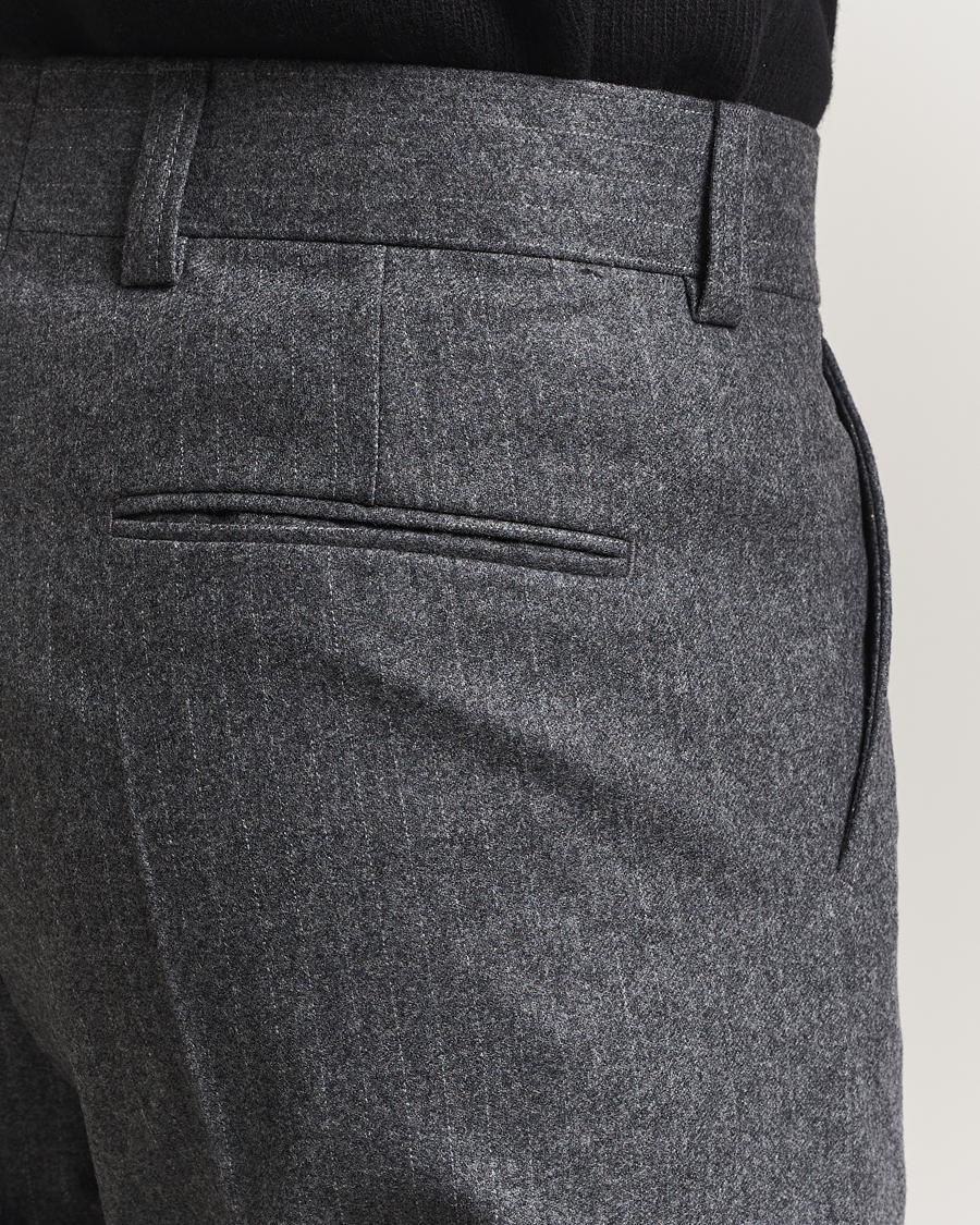 Men | Trousers | Tiger of Sweden | Tommie Wool Pleated Pinstriped Trousers Silver