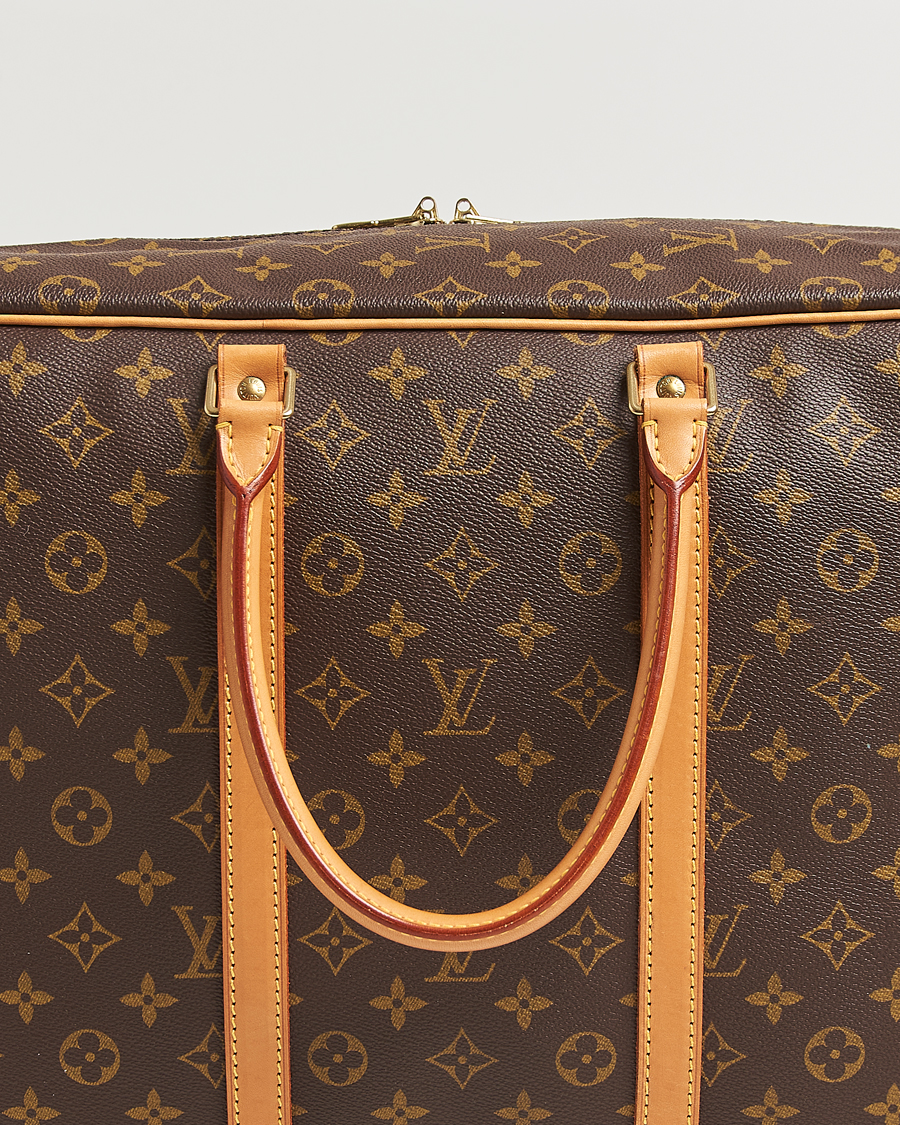 Louis Vuitton Pre-Owned Sirius Bag 45 Monogram at CareOfCarl.com