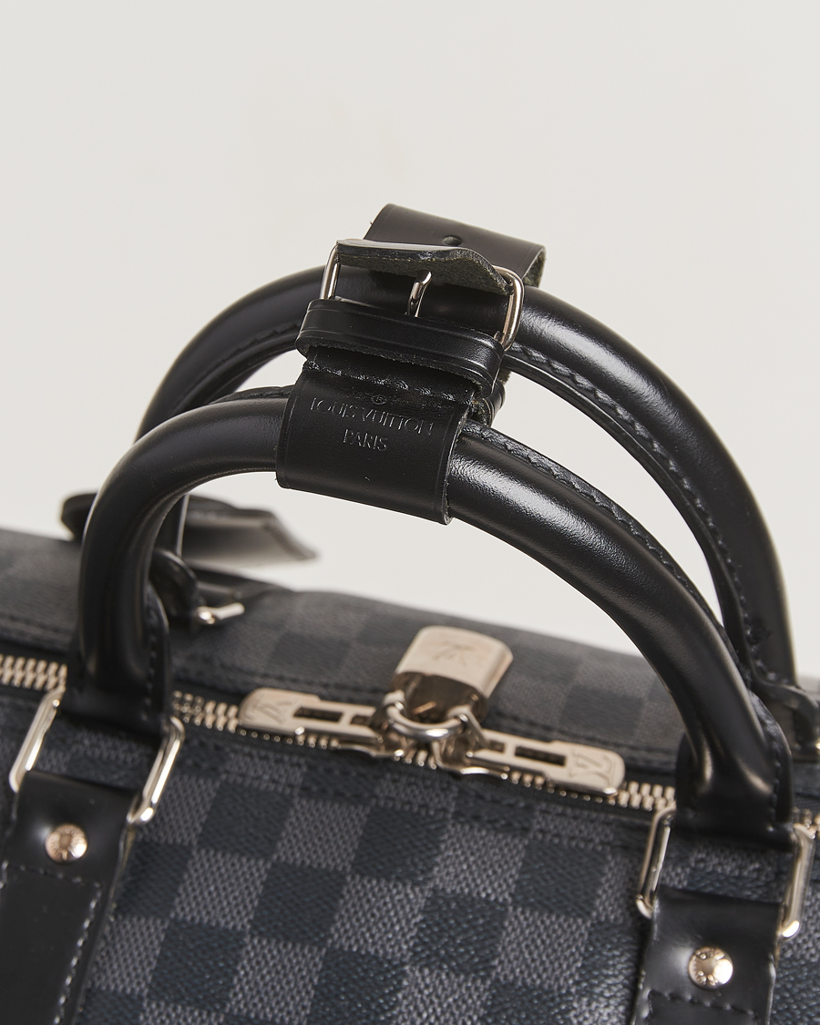 Men | Louis Vuitton Pre-Owned Keepall Bandoulière 55 Damier Graphite | Louis Vuitton Pre-Owned | Keepall Bandoulière 55 Damier Graphite
