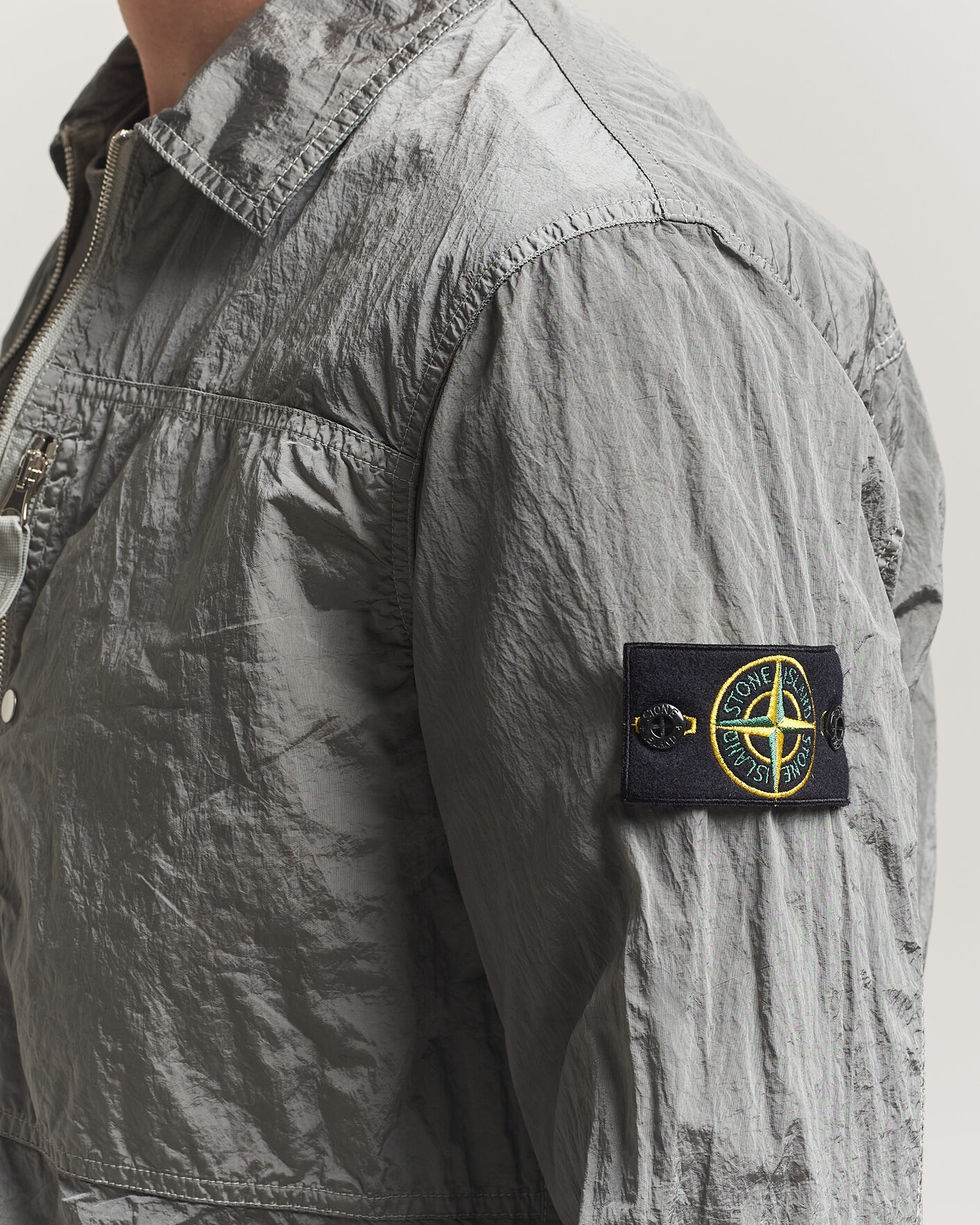 Stone Island Nylon Metal Zip Overshirt Pearl Grey at CareOfCarl.com