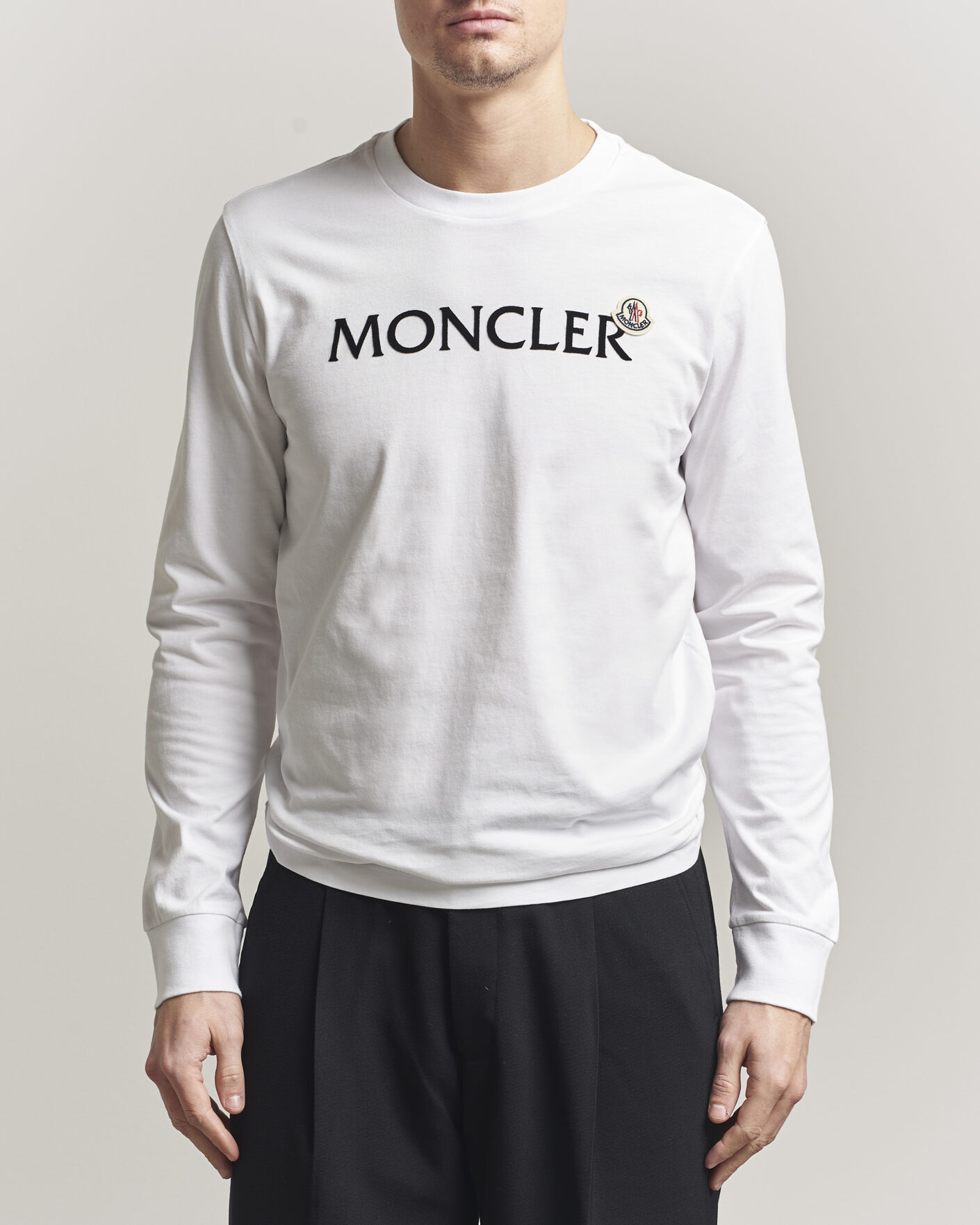 Moncler Lettering Logo Long Sleeve T-Shirt White at CareOfCarl.com