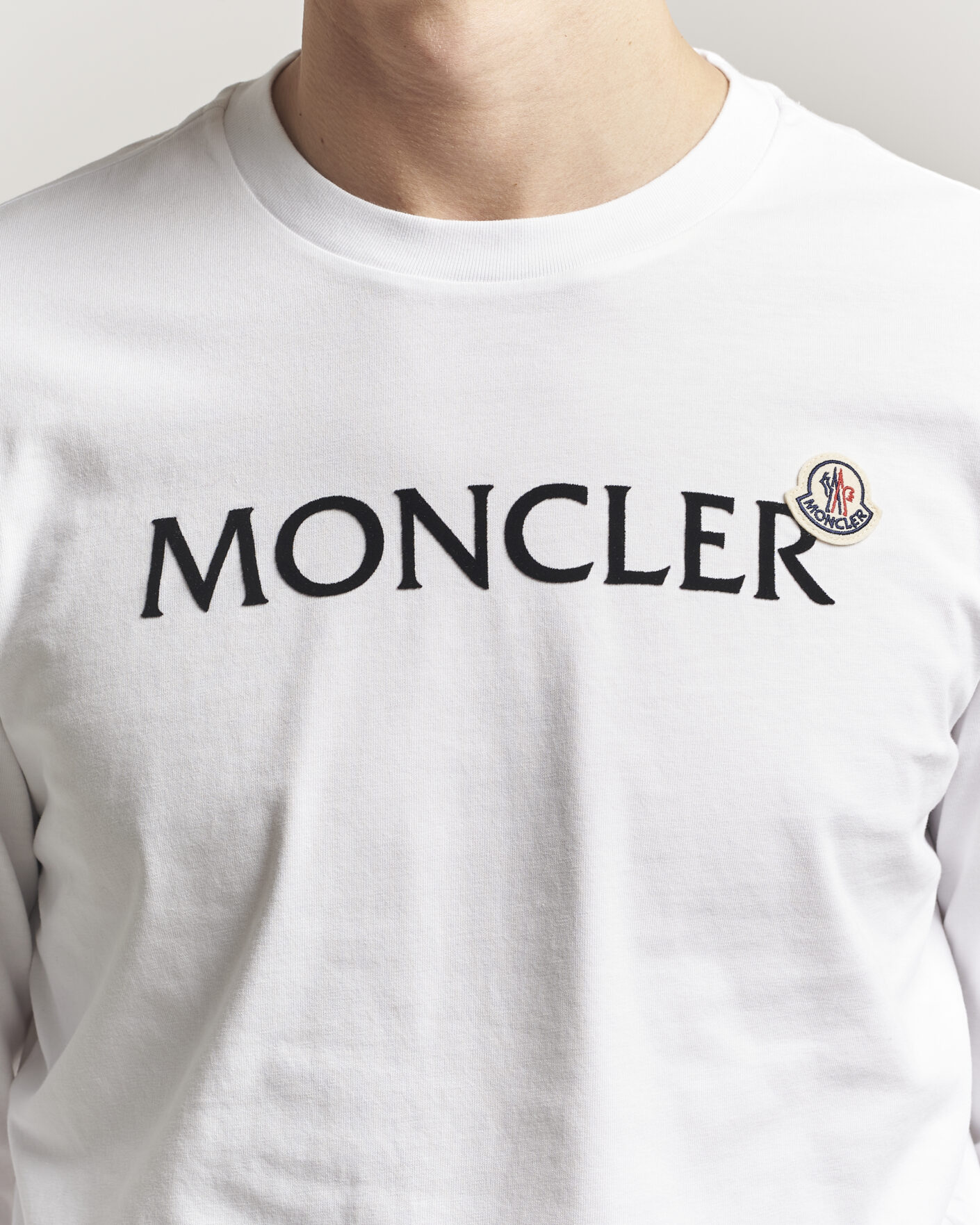 Moncler Lettering Logo Long Sleeve T-Shirt White at CareOfCarl.com