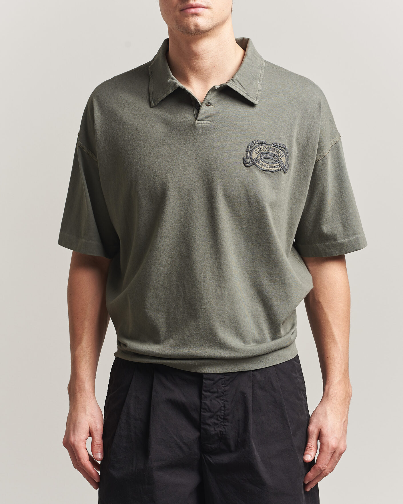 Men | Polo Shirts | C.P. Company | Boxy Fit Cotton Logo Polo Dark Green