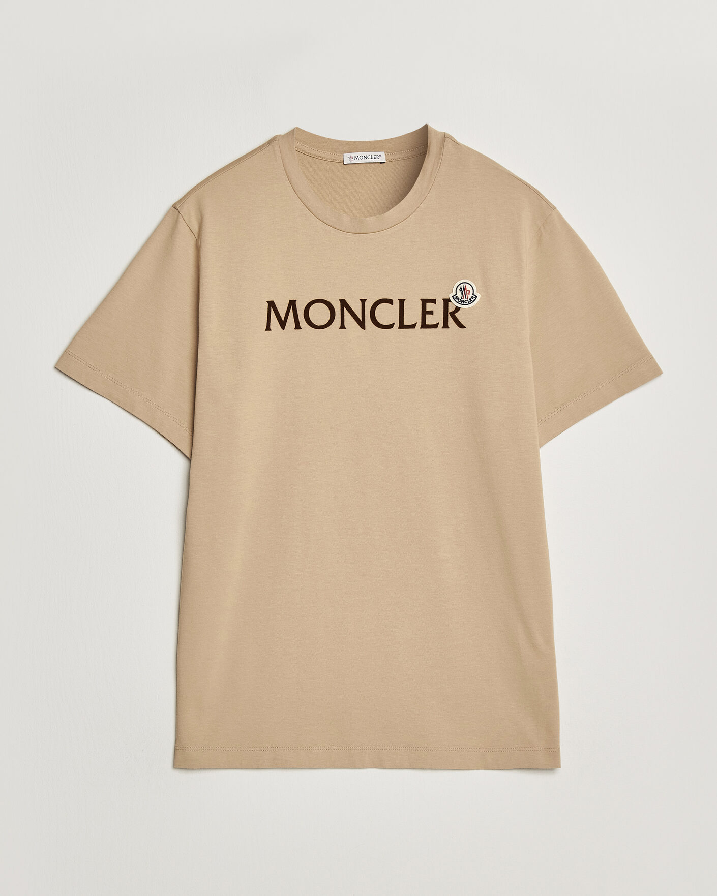 Moncler Lettering Logo T-Shirt Beige at CareOfCarl.com