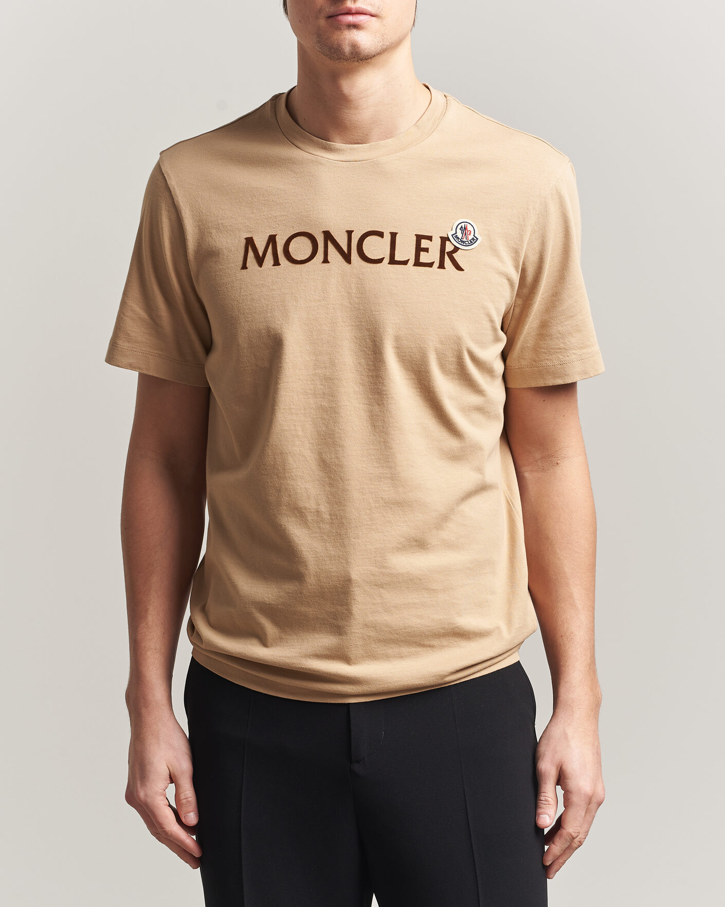 Moncler Lettering Logo T-Shirt Beige at CareOfCarl.com