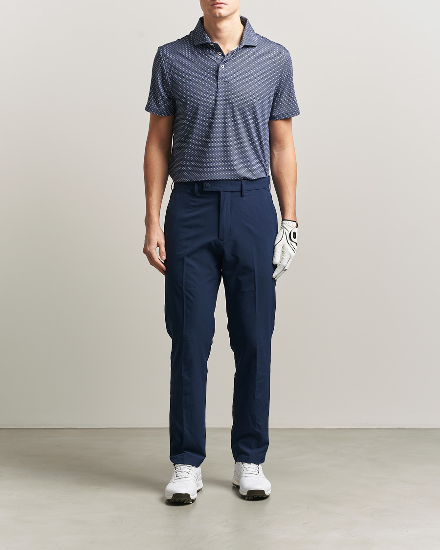 RLX Ralph Lauren Flat Front Golf Pants Refined Navy at CareOfCarl.com