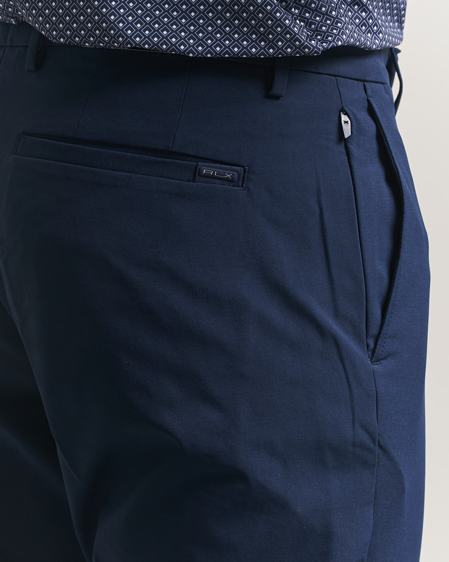 RLX Ralph Lauren Flat Front Golf Pants Refined Navy at CareOfCarl.com