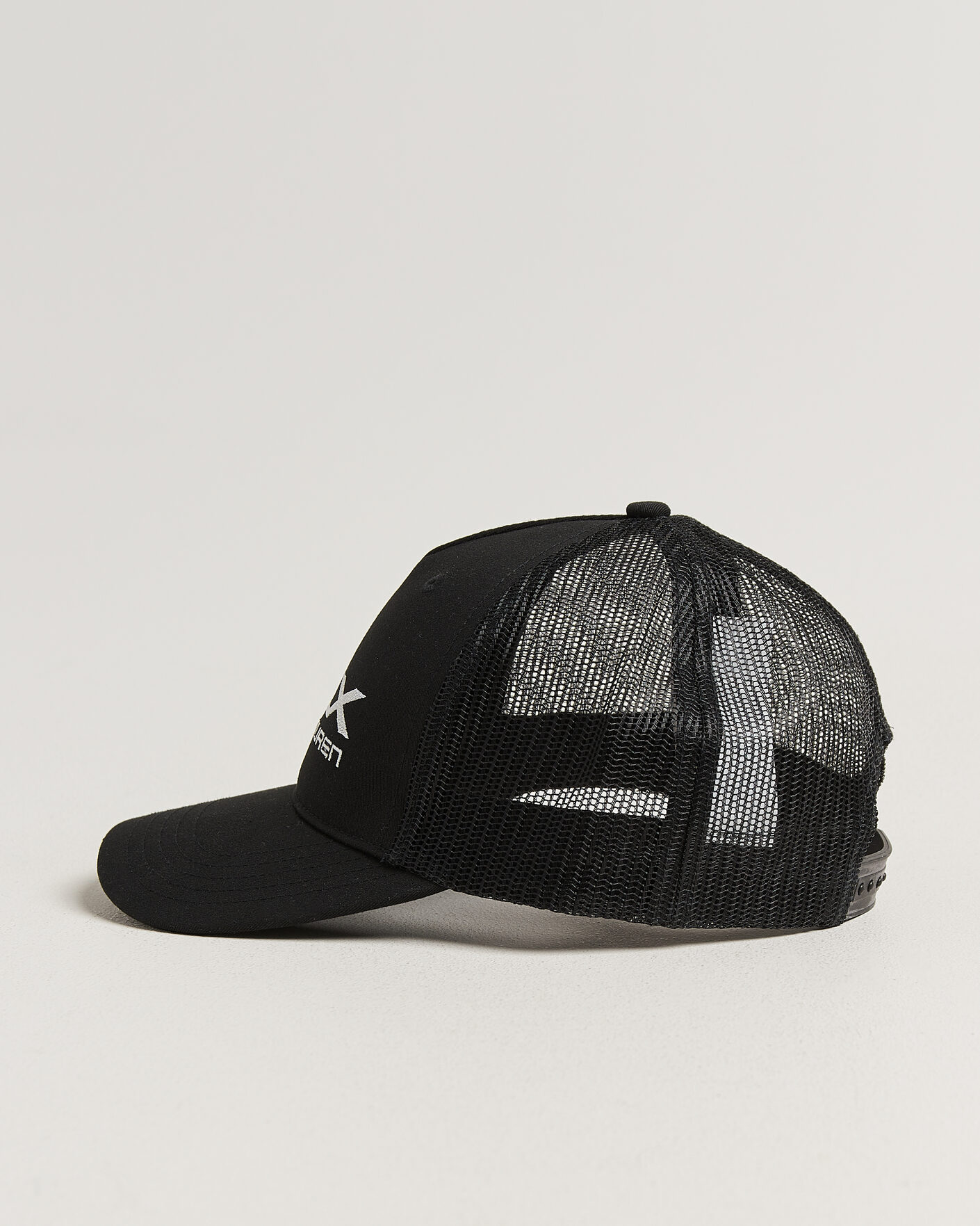 RLX Ralph Lauren Trucker Golf Cap Black at CareOfCarl.com