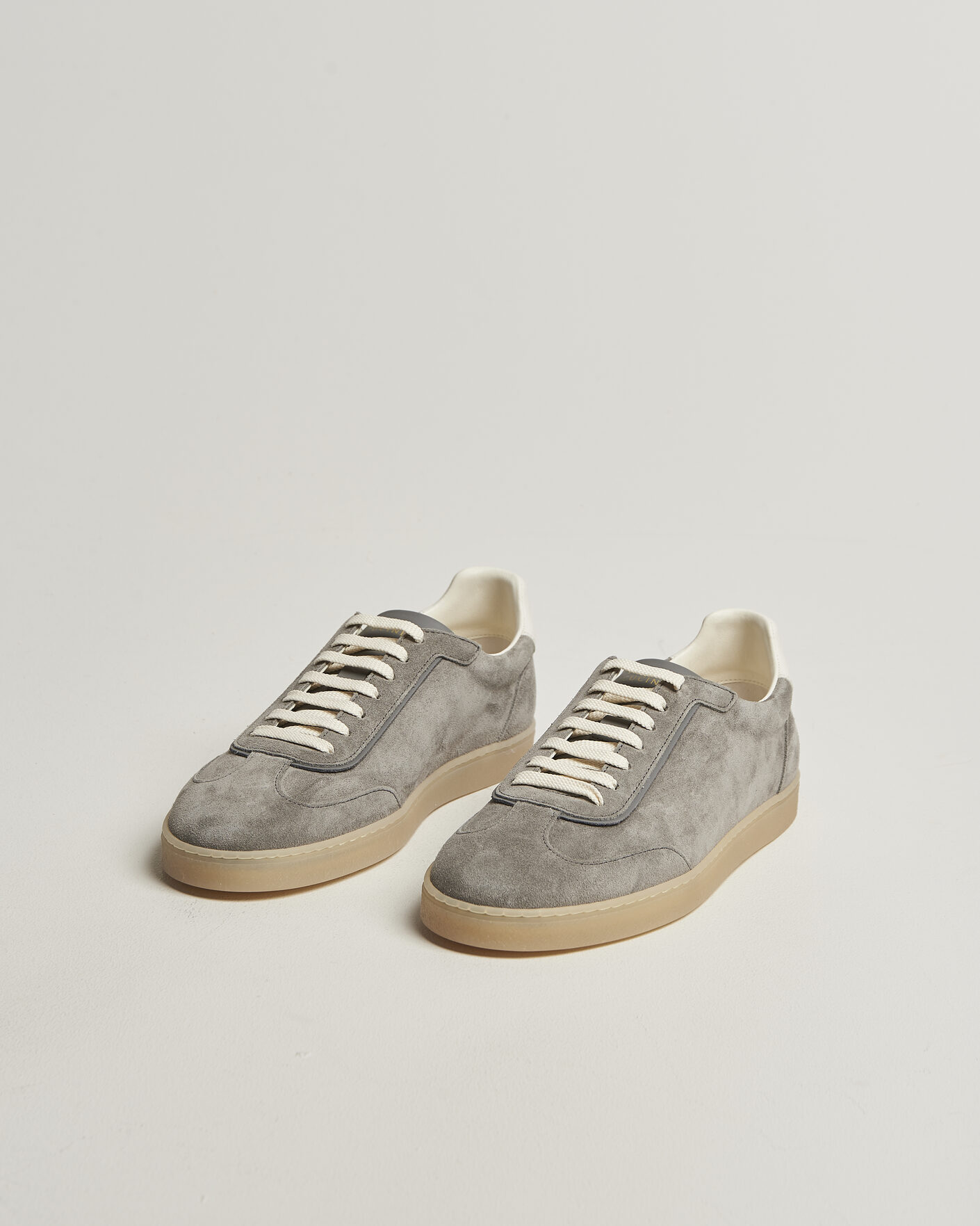 Brunello Cucinelli Low Top Sneakers Grey Suede at CareOfCarl.com