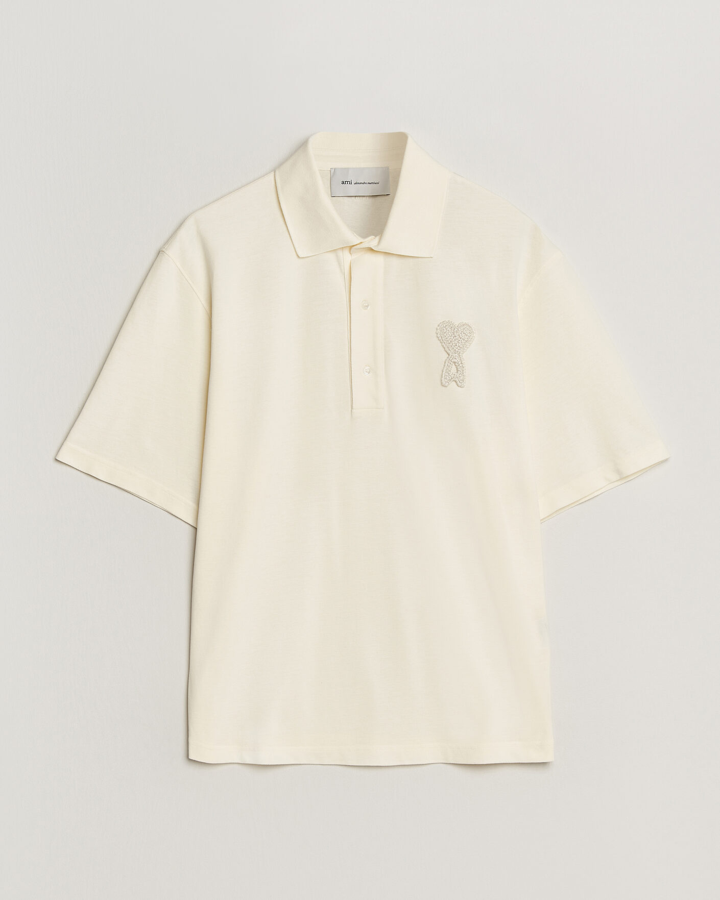 Men | Polo Shirts | AMI | Knitted Heart Logo Polo Creme