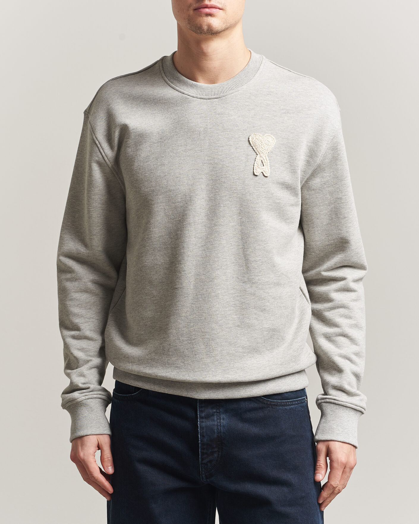 AMI Knitted Heart Logo Sweatshirt Grey Melange at CareOfCarl.com