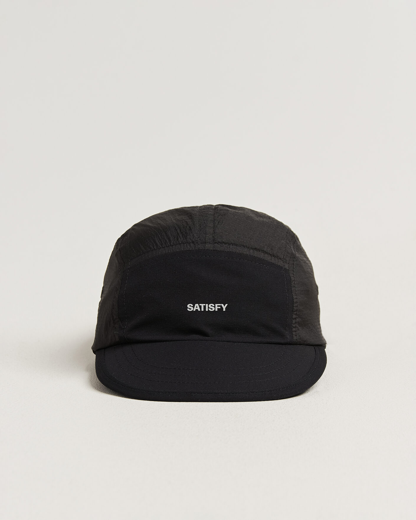 Satisfy Rippy Trail Cap Black at CareOfCarl.com
