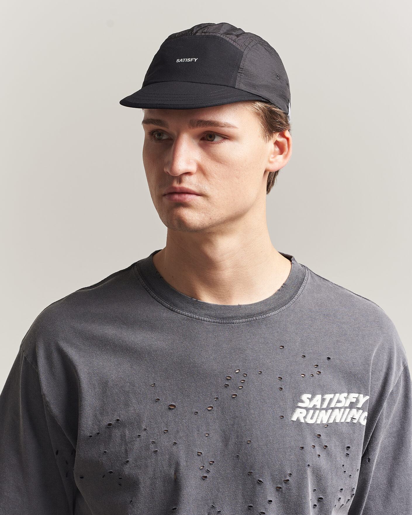 Satisfy Rippy Trail Cap Black at CareOfCarl.com