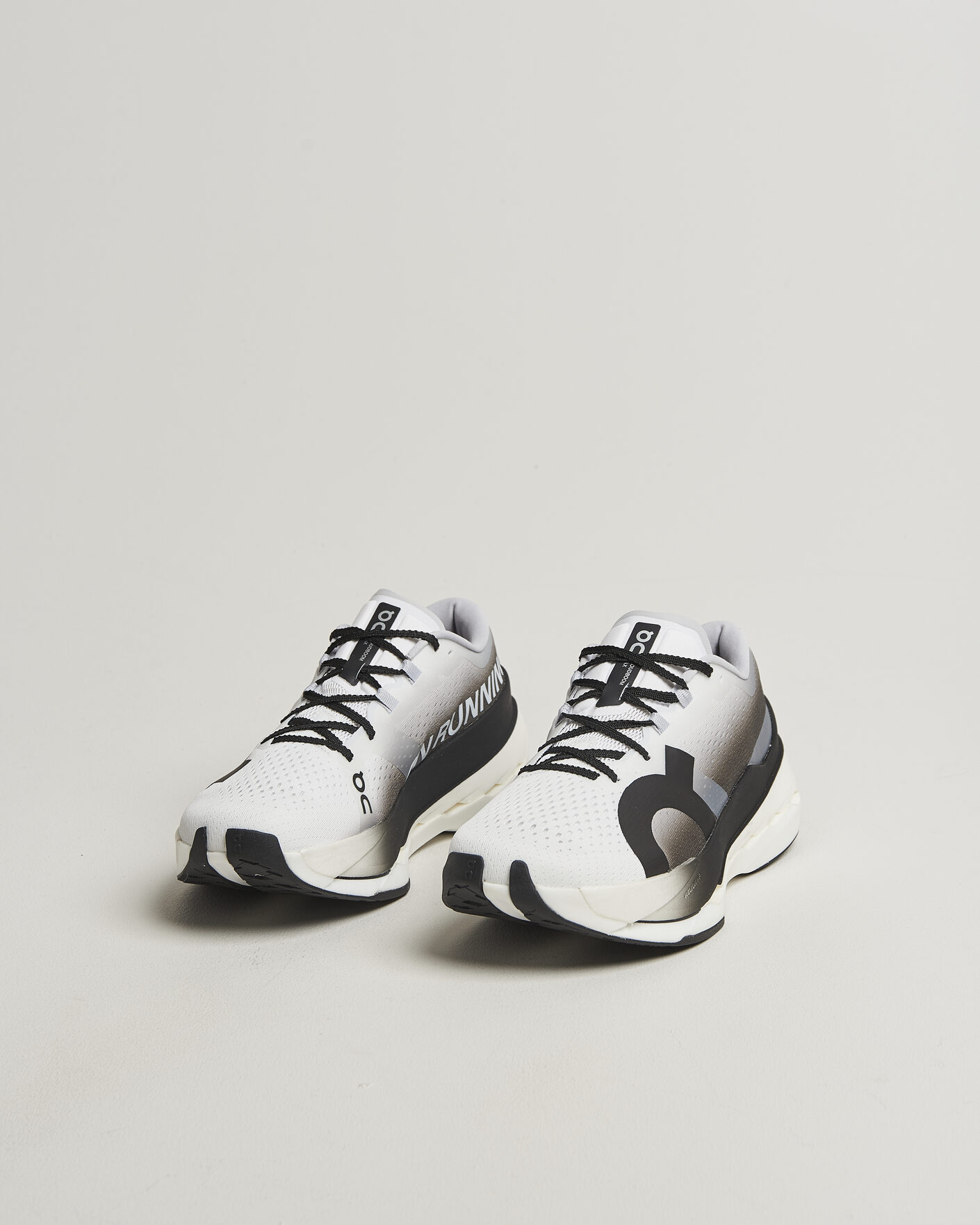 ON Cloudboom Max White/Black at CareOfCarl.com