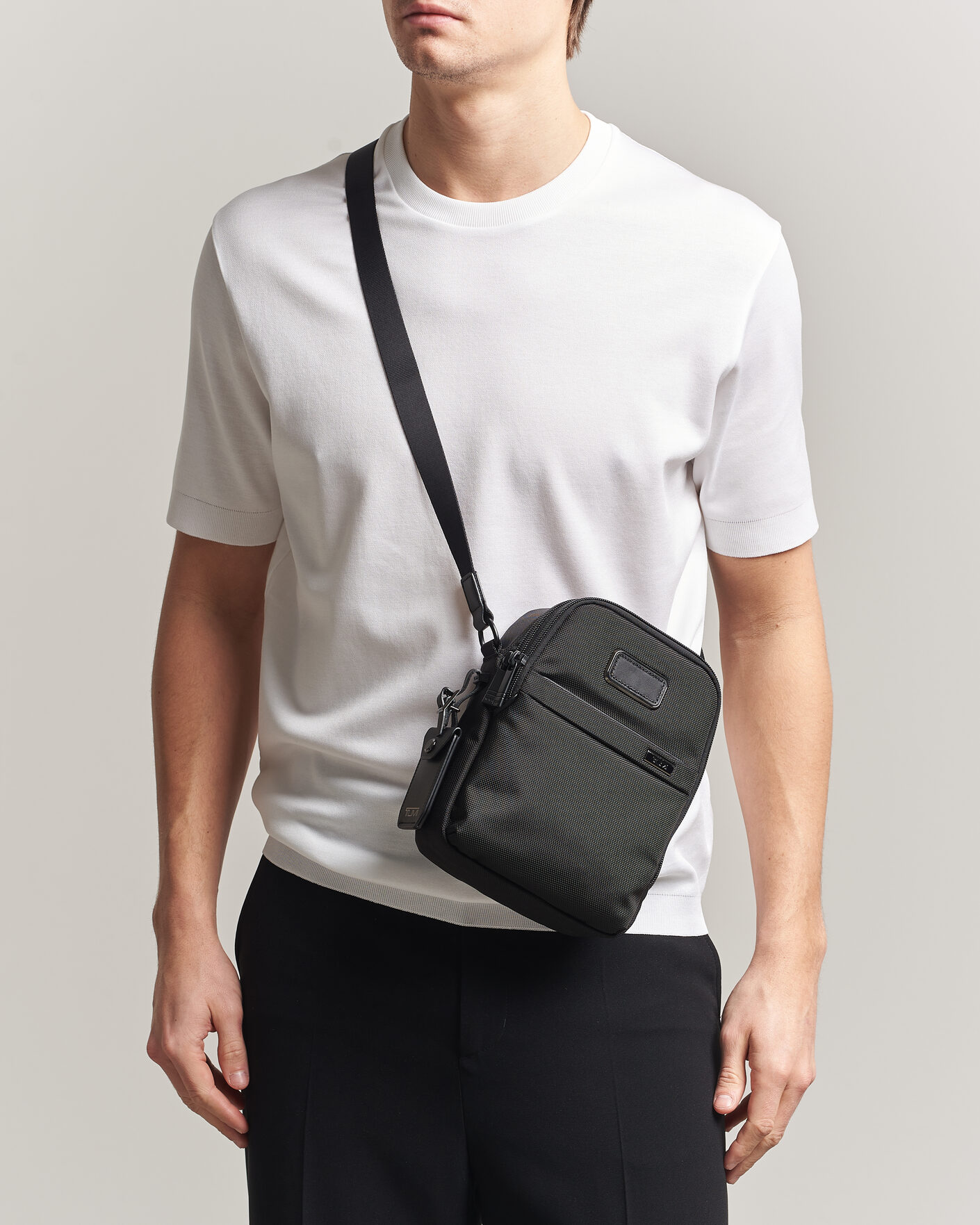 TUMI Alpha 3 Pocket Small Crossbody Bag Black at CareOfCarl.com