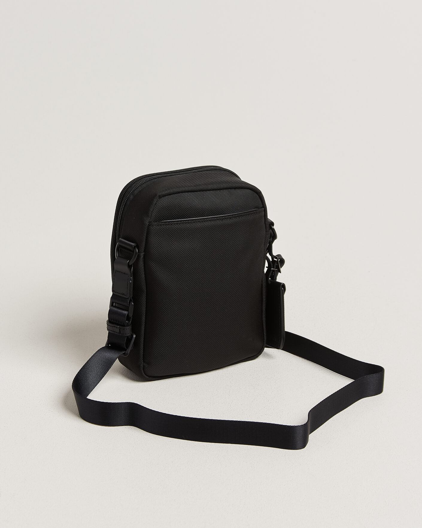 TUMI Alpha 4 Small Crossbody Bag Black at CareOfCarl.com