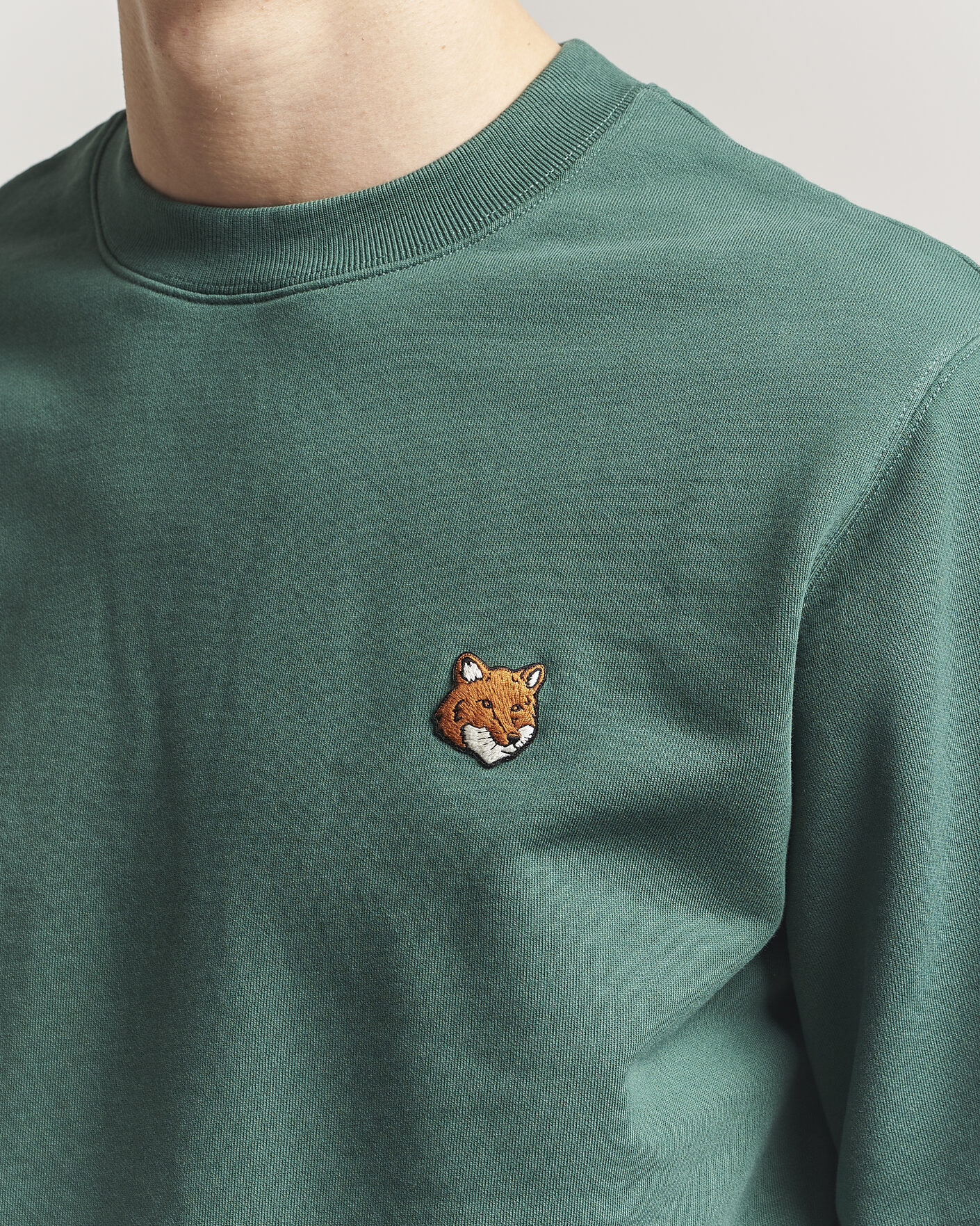 Maison Kitsuné Fox Head Sweatshirt Bottle Green at CareOfCarl.com