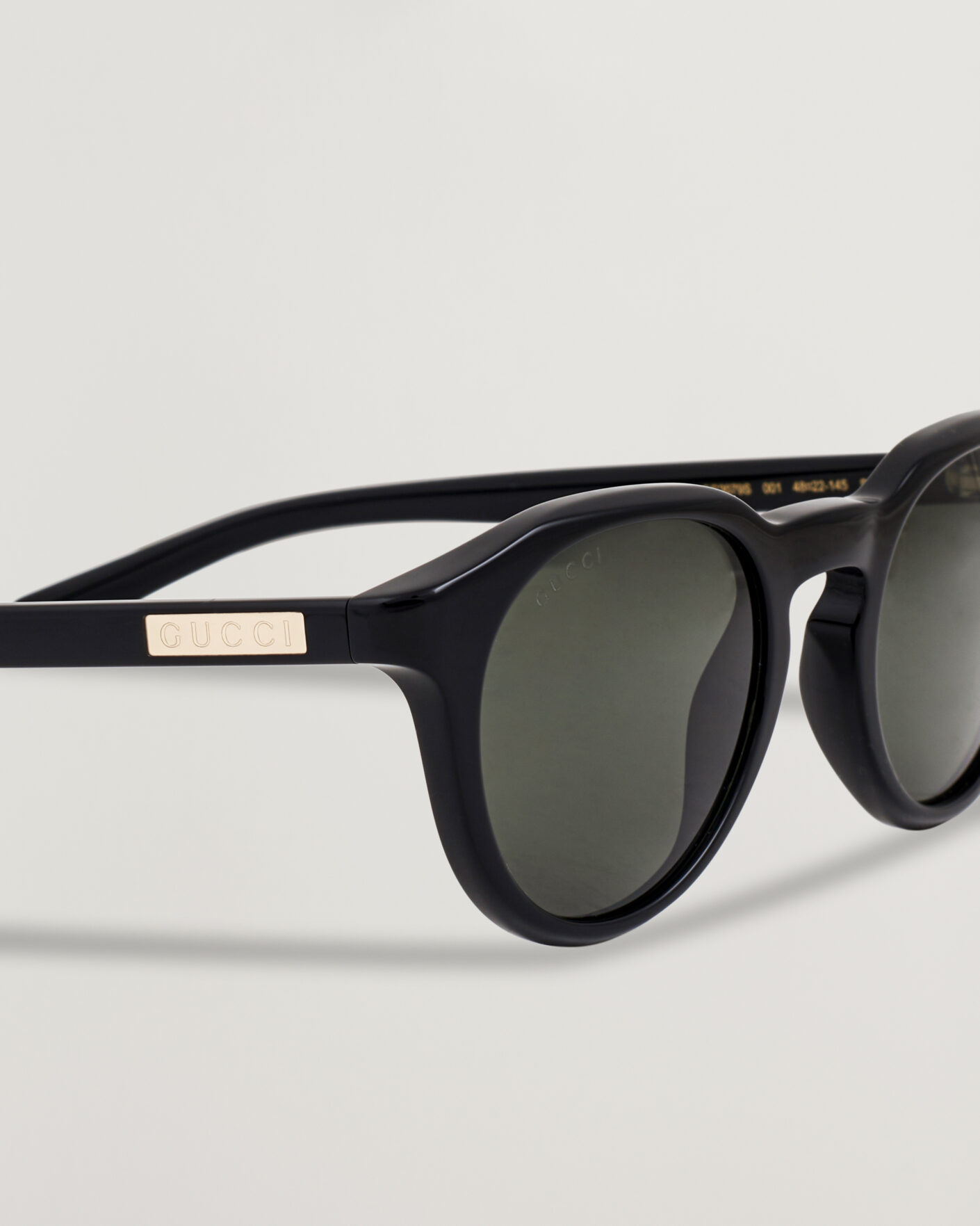 Gucci GG2079S Sunglasses Black at CareOfCarl.com