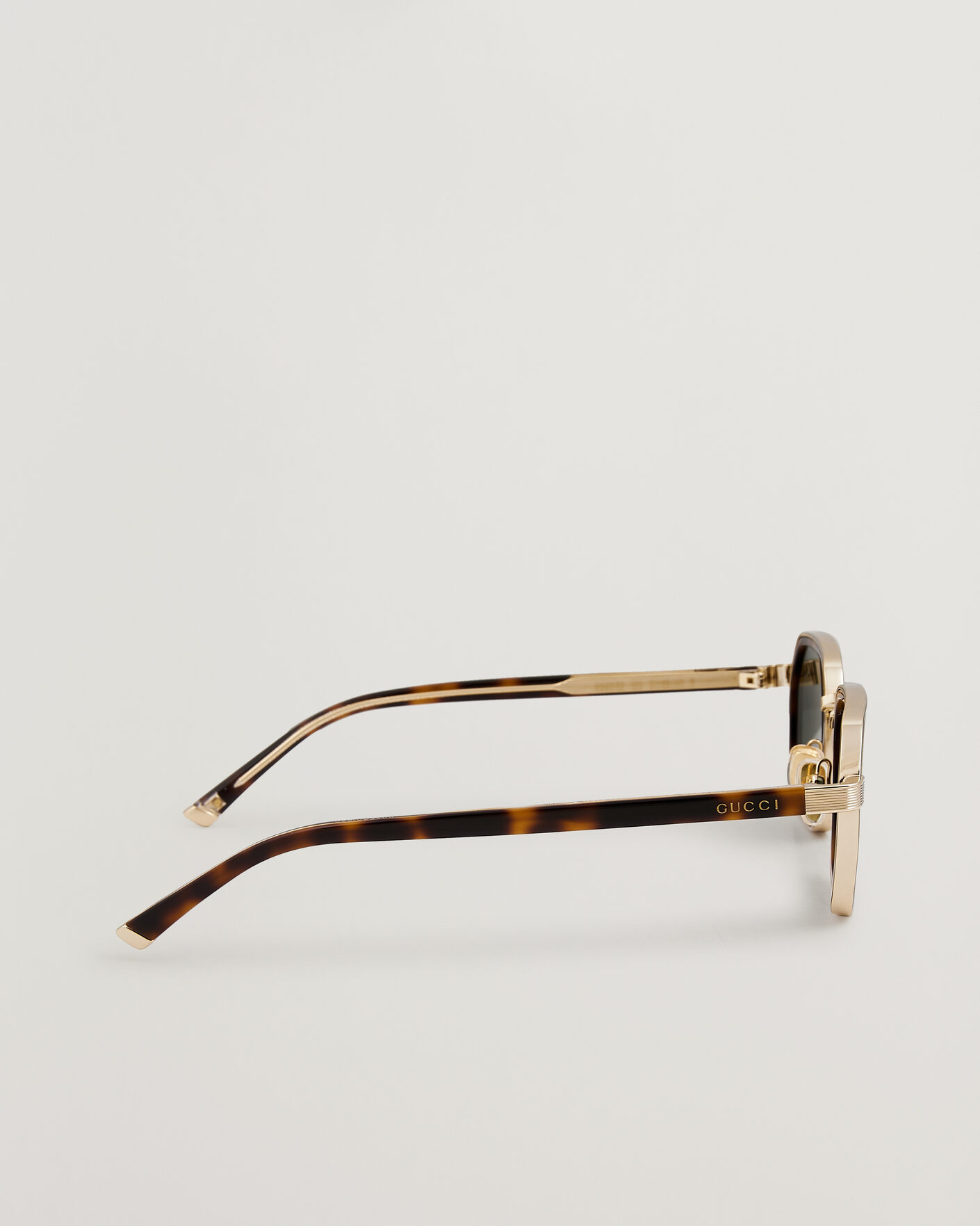 Gucci GG2074S Sunglasses Gold at CareOfCarl.com