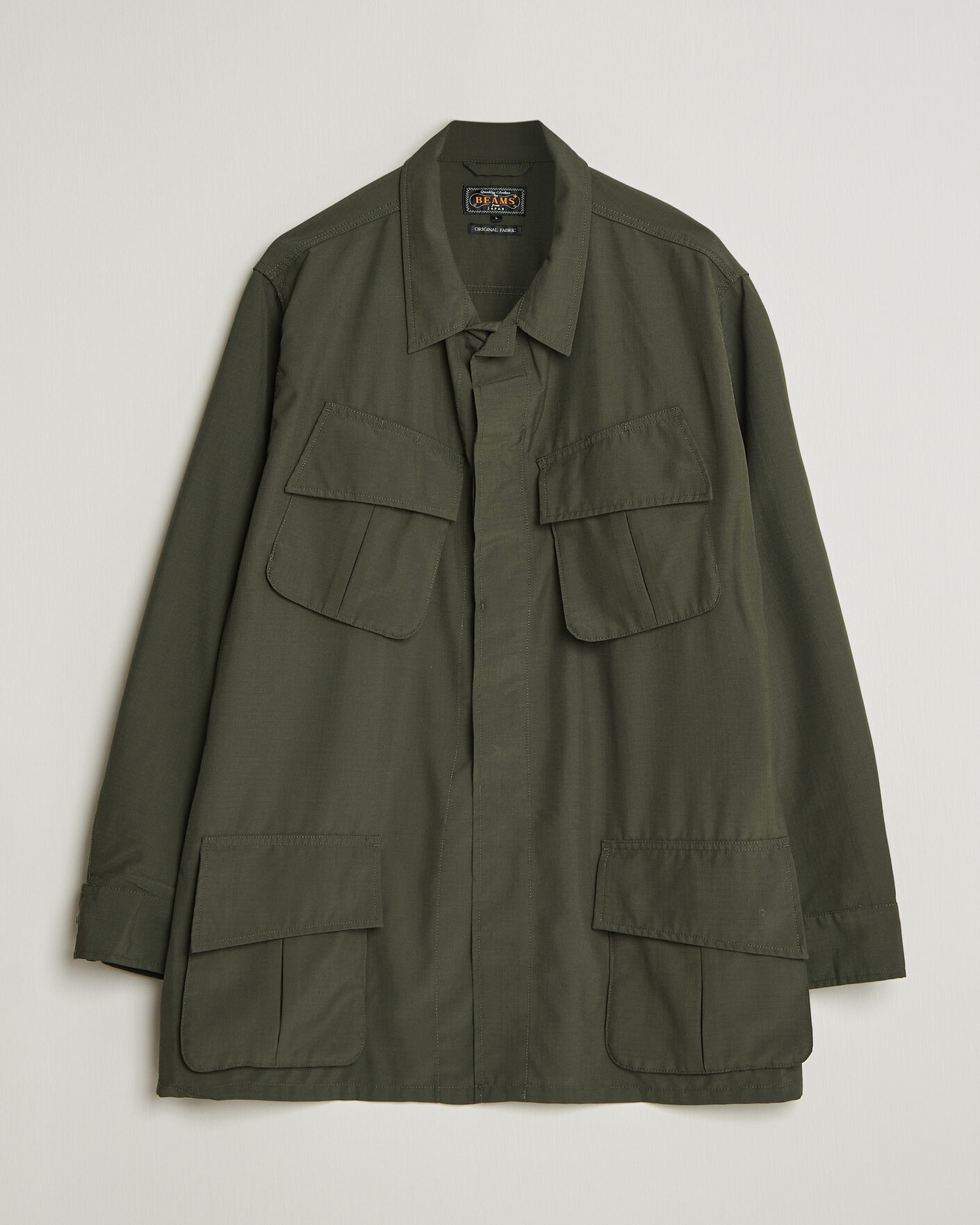 BEAMS PLUS MIL Fatigue Jacket Olive at CareOfCarl.com