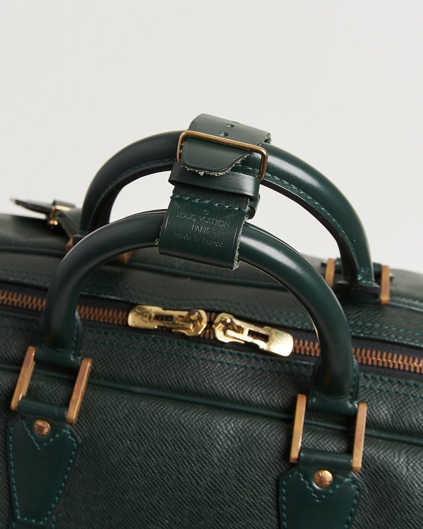 Louis Vuitton Pre-Owned Taiga Kendall GM Bag Green at CareOfCarl.com