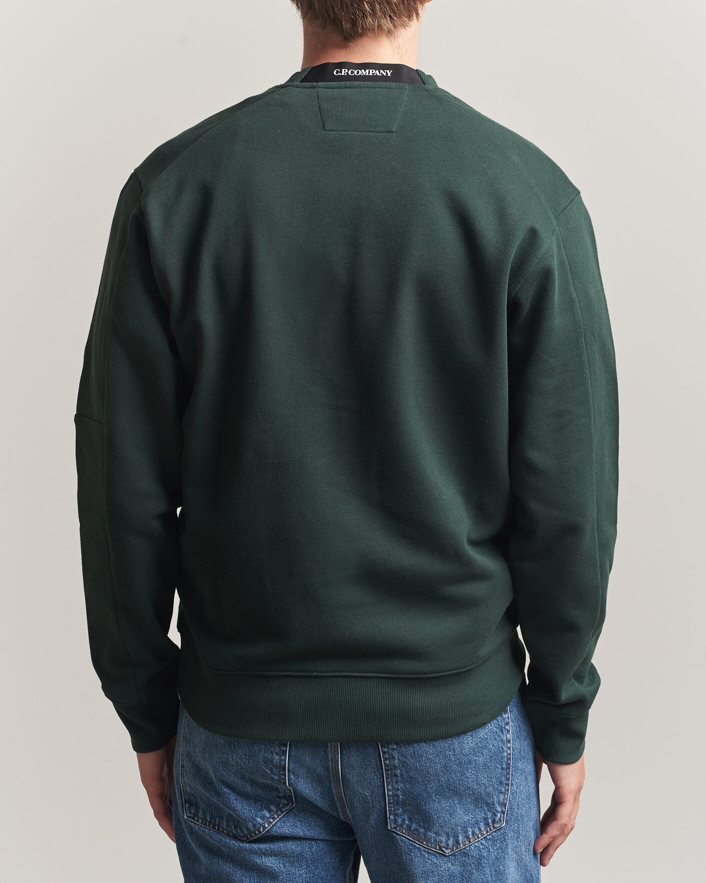 Men | Sweaters & Knitwear | C.P. Company | Diagonal Raised Fleece Lens Sweatshirt Emerald Green
