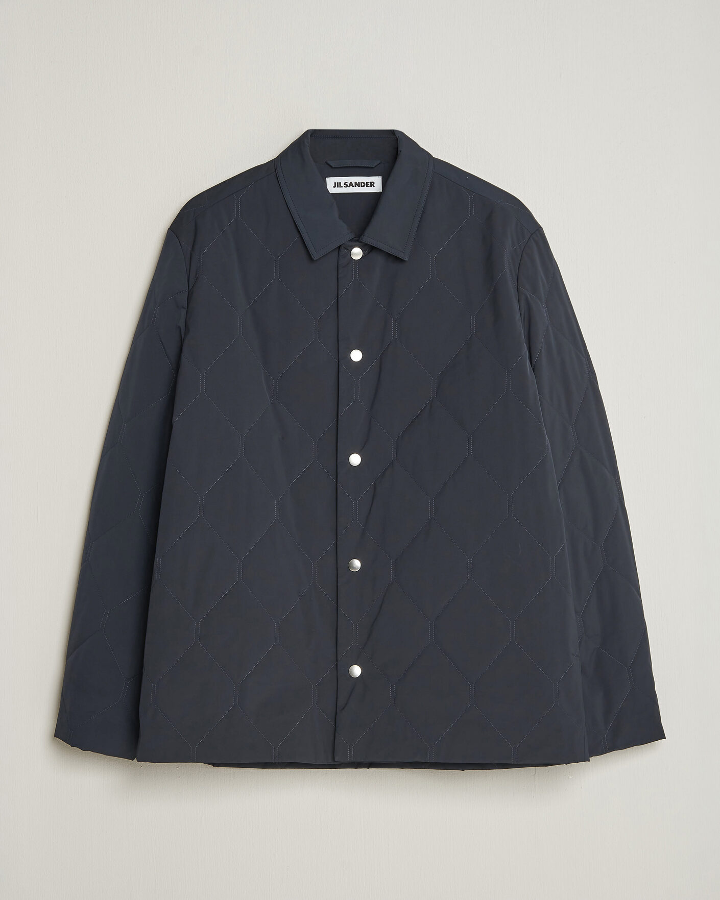 Jil Sander Quilted Down Jacket Navy at CareOfCarl.com