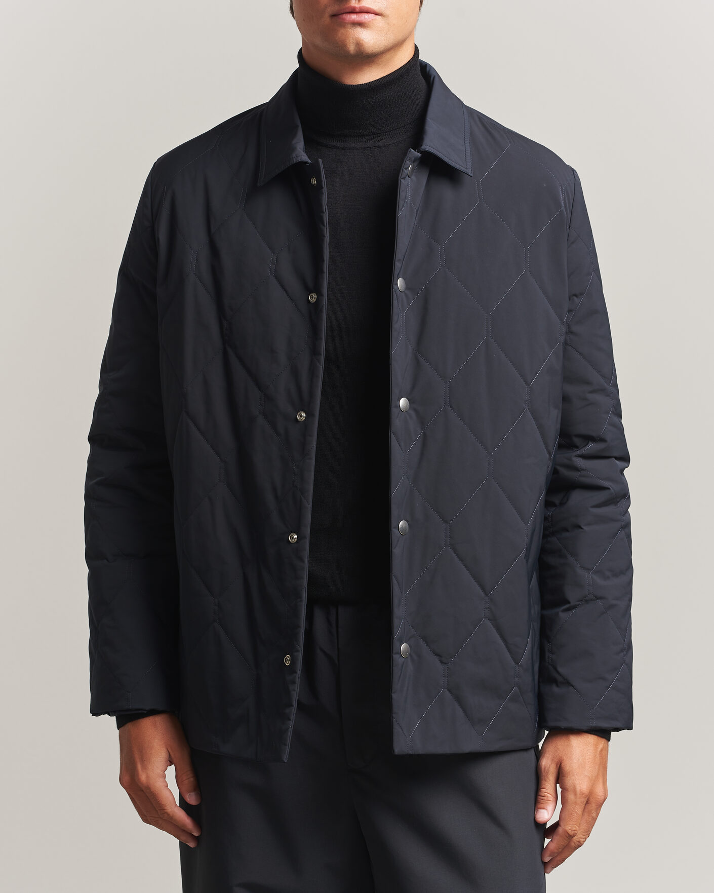 Jil Sander Quilted Down Jacket Navy at CareOfCarl.com